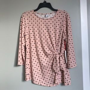 Pretty pink top w/ waist-flattering tie above hip!